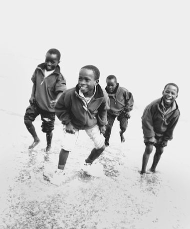 Boys on the beach, Newcastle County Down, Northern Ireland